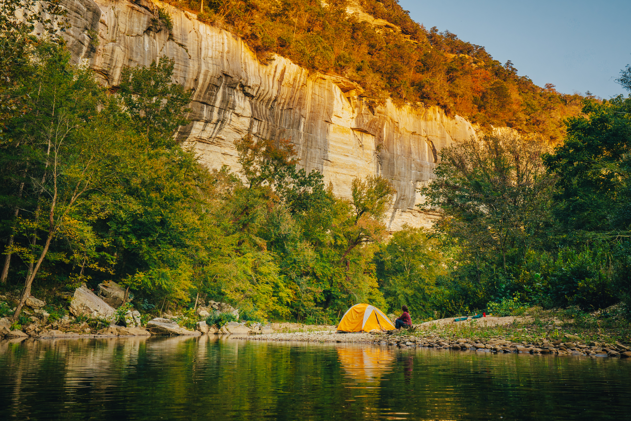 Tent camping beneath the towering bluffs of the Buffalo National River near Ponca, AR.