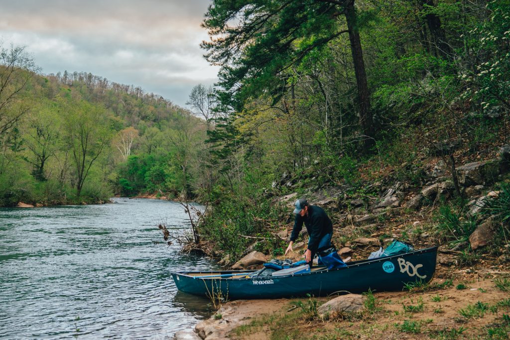 A canoeist packs his boat on the Buffalo National River.